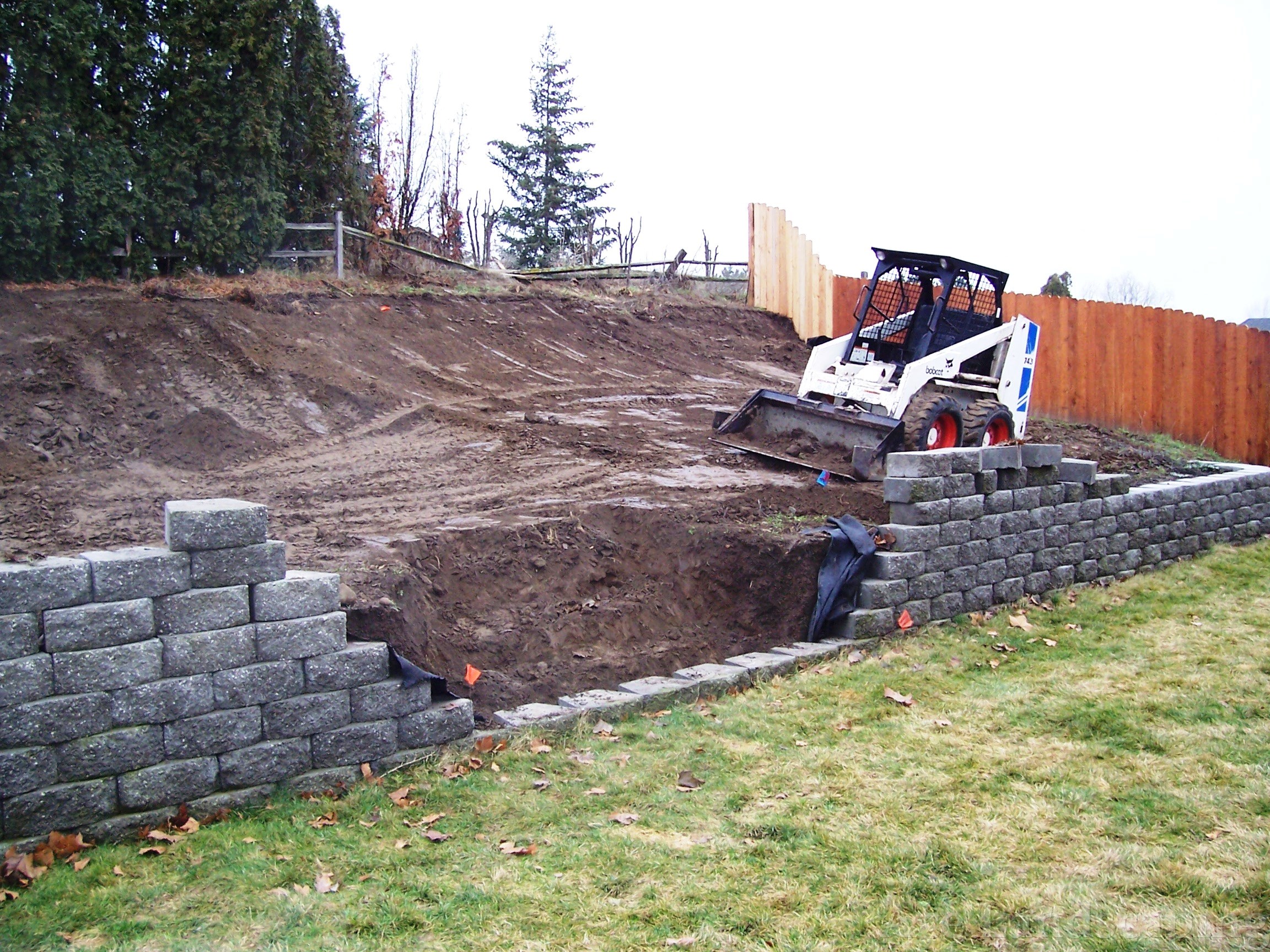 RETAINING WALL CONTRACTOR Brick, Rock, and Concrete Retainer Walls