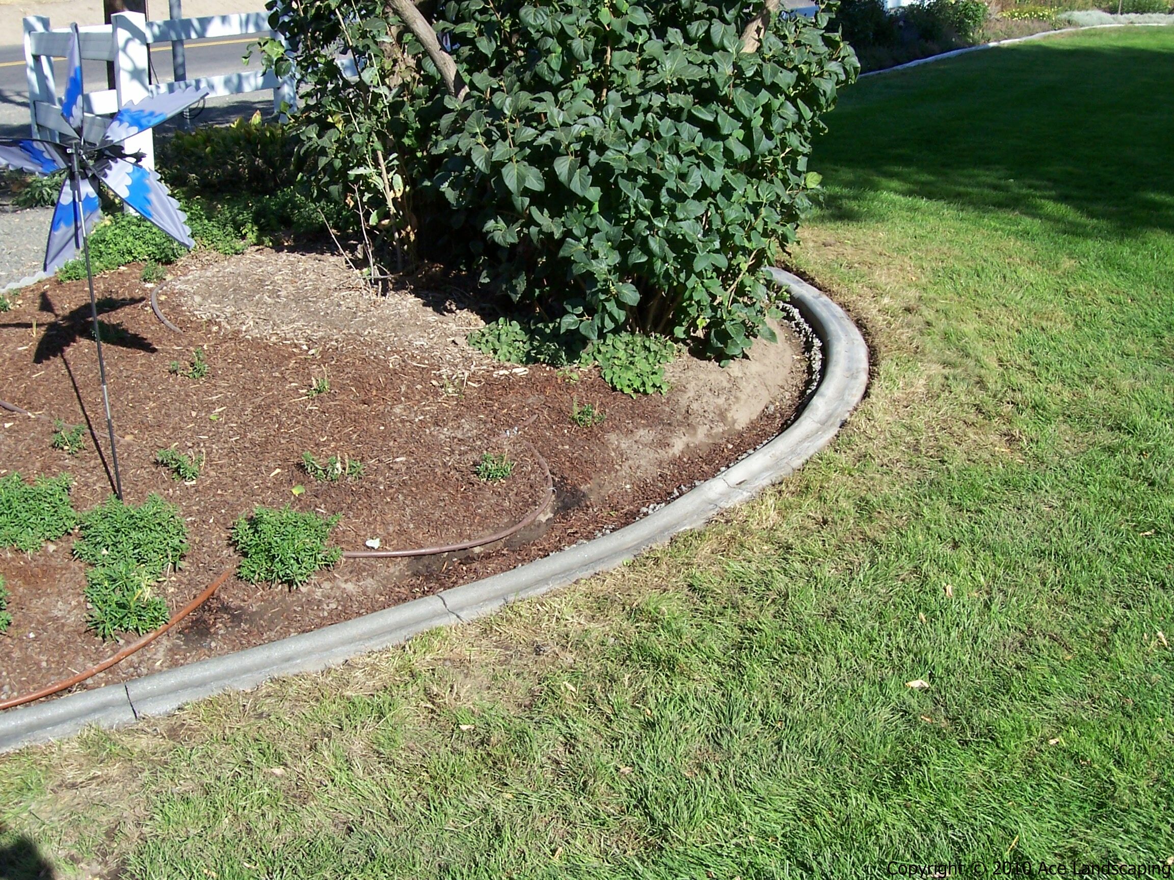 CONCRETE CURBING CONTRACTOR Concrete Landscape Edging & Borders